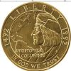 Золотая монета в честь 500 летия открытия Америки.