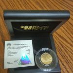 Золотая монета 50 рублей 2014 года. Олимпиада в Сочи.  Коньки
